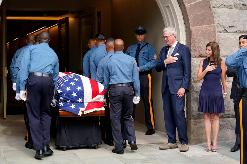 Gov. Phil Murphy and first lady Tammy Murphy receive the flag-draped casket of Lt. Gov. Sheila Oliver at the New Jersey State House on Aug. 10, 2023, in Trenton. 