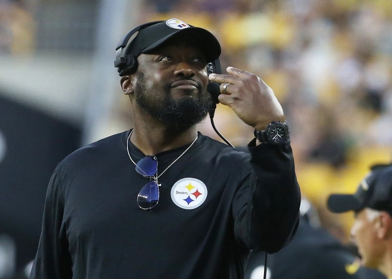 Mike Tomlin looking