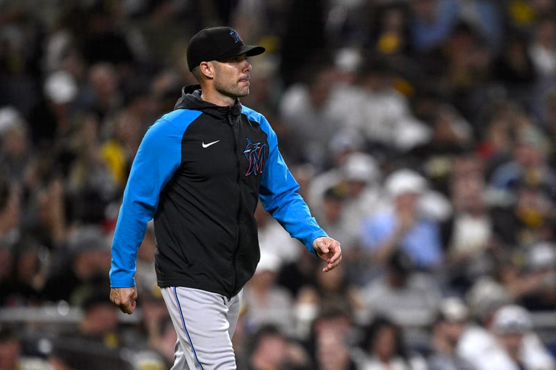 Miami Marlins manager Skip Schumaker walks to the mound during the fourth inning against the San Diego Padres at Petco Park