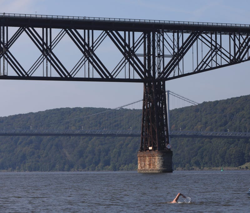 Lewis Pugh approaches the Walkway Over the Hudson during his swim down the Hudson River in Poughkeepsie on Sept. 5, 2023