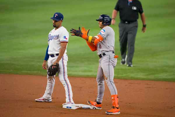 Houston Astros shortstop Jeremy Pena (3) celebrates hitting a double against the Texas Rangers during the first inning at Globe Life Field