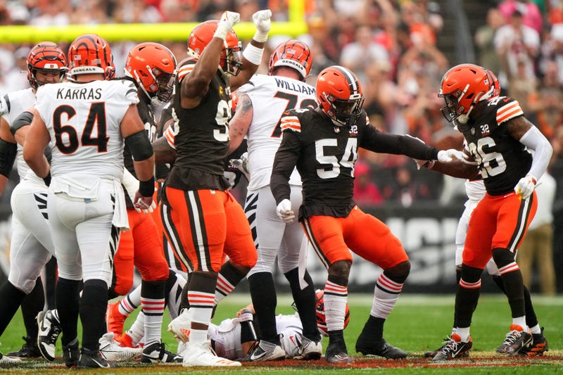 Cleveland Browns defensive end Ogbo Okoronkwo (54) celebrates a sack of Cincinnati Bengals quarterback Joe Burrow (9) in the first quarter of an NFL football game between the Cincinnati Bengals and Cleveland Browns