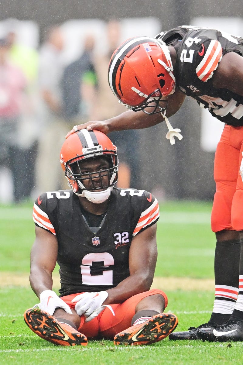 Cleveland Browns running back Nick Chubb (24) checks on wide receiver Amari Cooper (2) during the first half against the Cincinnati Bengals at Cleveland Browns Stadium.