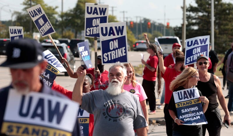 Striking Ford Motor Company workers picket outside of Gate 9 at the Michigan Assembly in Wayne where the Ford Bronco is made on Friday, Sept. 15, 2023.