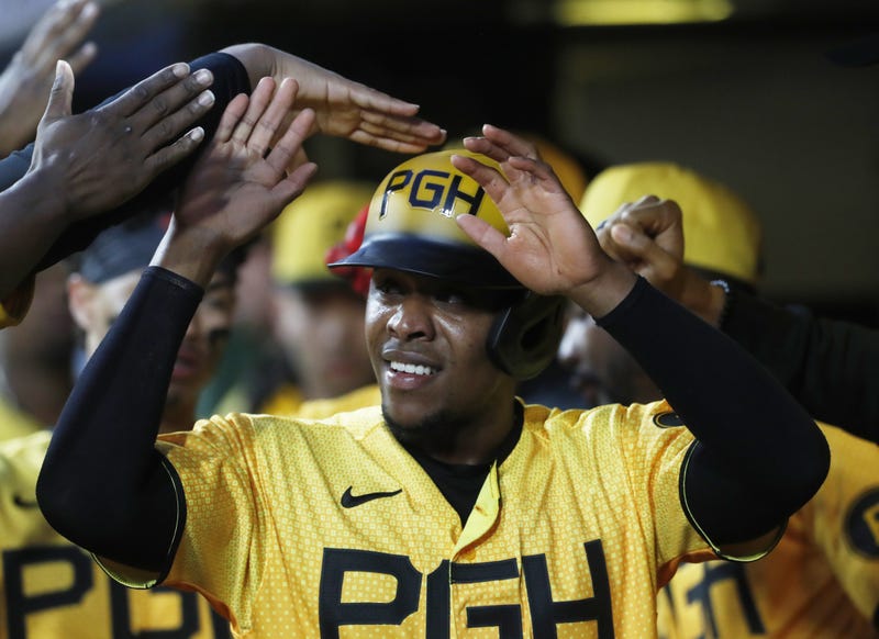 Pittsburgh Pirates third baseman Ke'Bryan Hayes (13) celebrates in the dugout after scoring a run against the New York Yankees