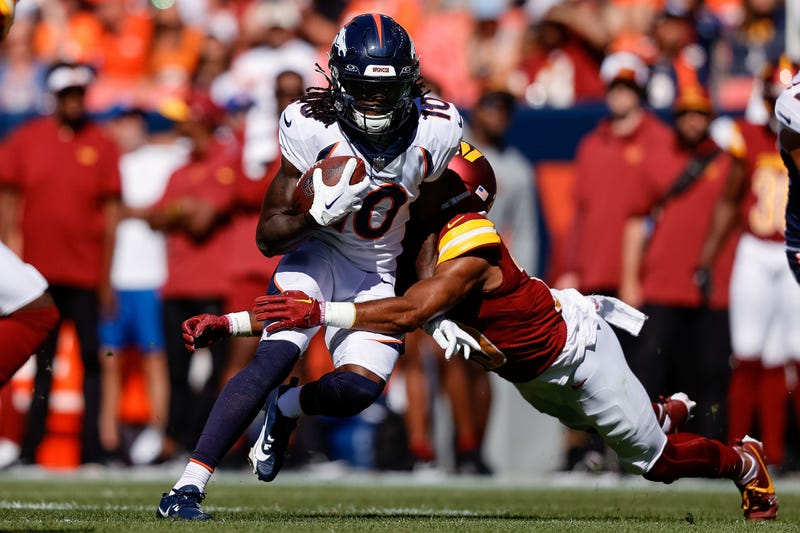 Denver Broncos, now Cleveland Browns wide receiver Jerry Jeudy (10) is tackled by Washington Commanders cornerback Kendall Fuller (29) in a game at Empower Field at Mile High last season.