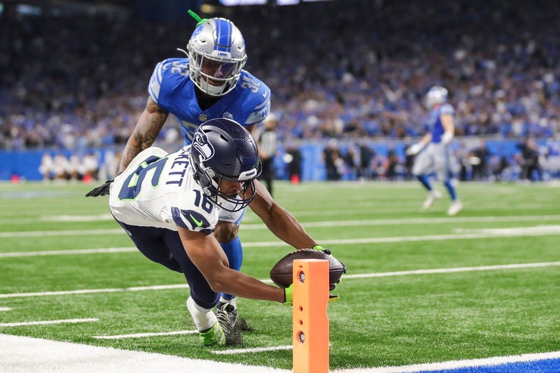 Tyler Lockett dives to make the walk off touchdown in overtime