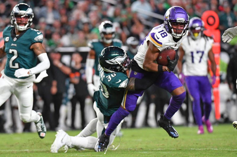 Minnesota Vikings wide receiver Justin Jefferson (18) is tackled by Philadelphia Eagles safety Justin Evans (30) at Lincoln Financial Field.