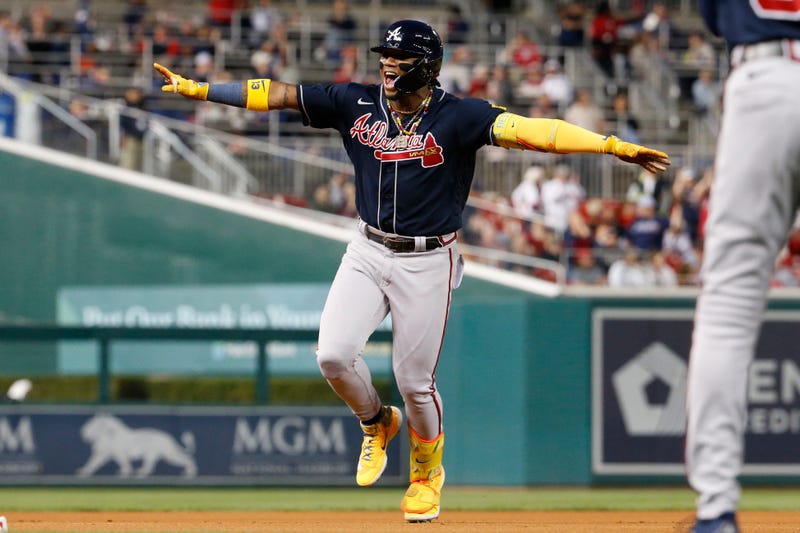 Sep 22, 2023; Washington, District of Columbia, USA; Atlanta Braves right fielder Ronald Acuna Jr. (13) celebrates after hitting his 40th home run of the season against the Washington Nationals during the first inning at Nationals Park. Mandatory Credit: Amber Searls-USA TODAY Sports