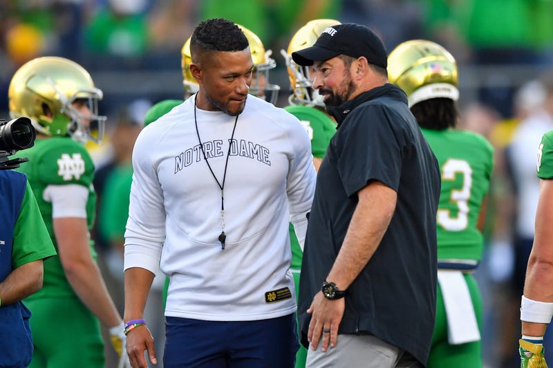 Sep 23, 2023; South Bend, Indiana, USA; Notre Dame Fighting Irish head coach Marcus Freeman and Ohio State Buckeyes head coach Ryan Day chat before the game at Notre Dame Stadium. 