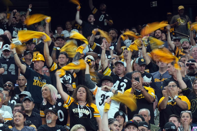Pittsburgh Steelers fans wave Terrible Towels during the game against the Las Vegas Raiders at Allegiant Stadium.