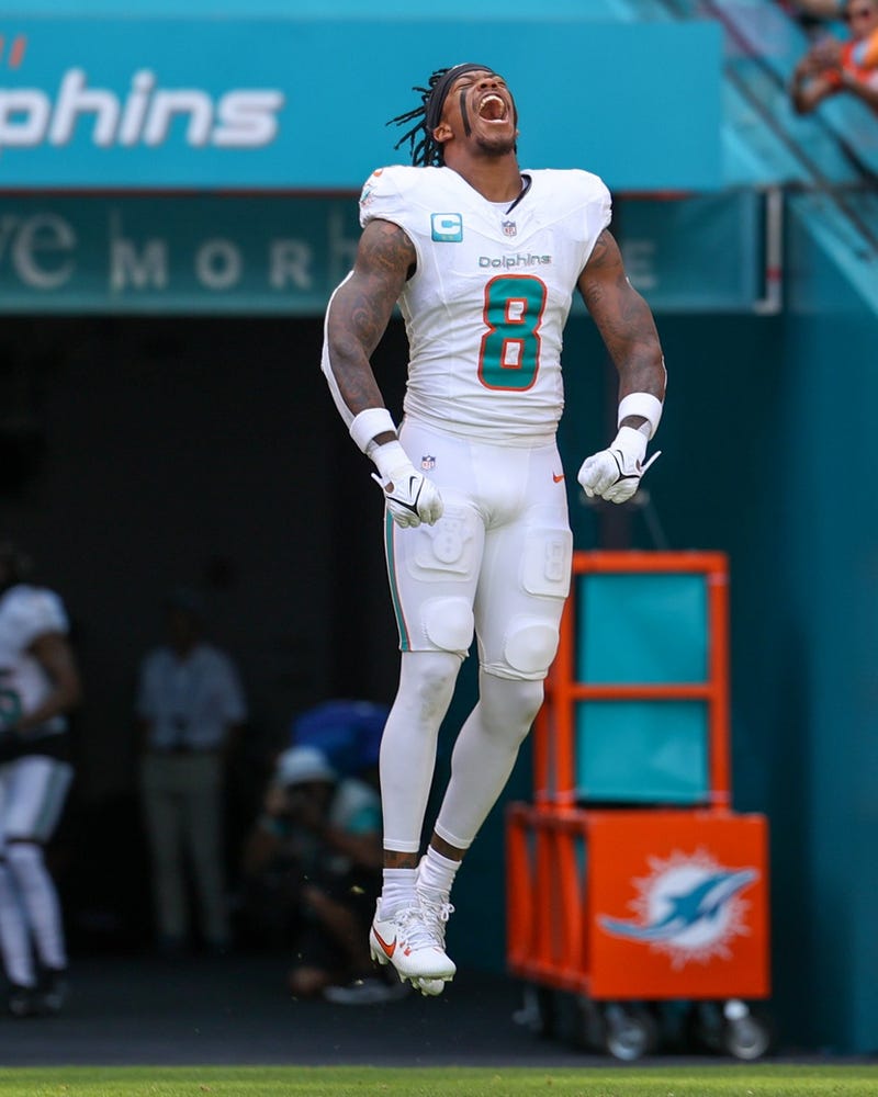 Miami Dolphins safety Jevon Holland (8) is introduced onto the field before a game against the Denver Broncos