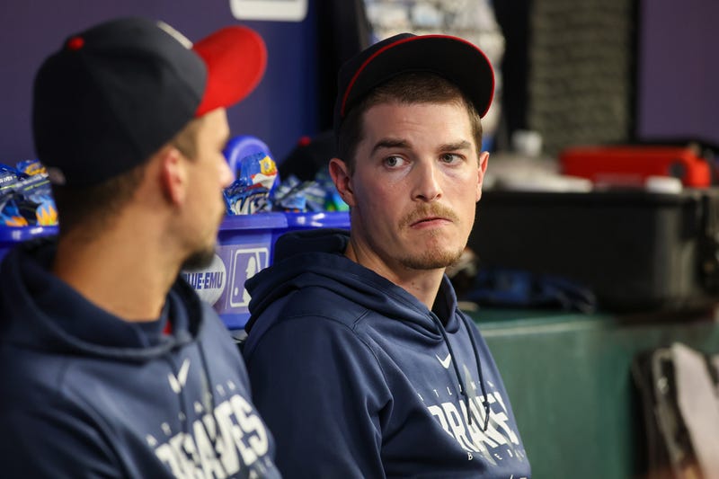 Former Braves Pitcher Max Fried talks to pitcher Charlie Morton