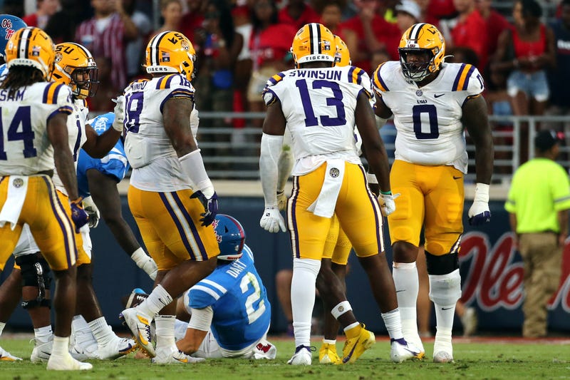  LSU Tigers defensive linemen Maason Smith (0) reacts after a sack