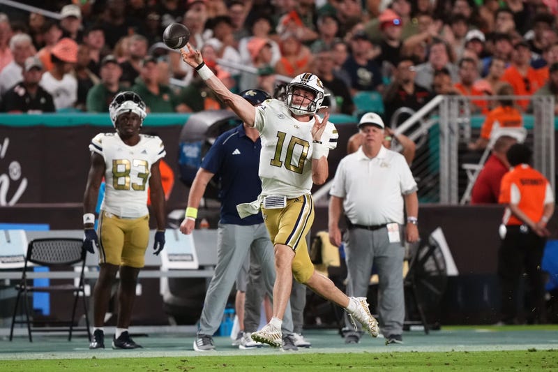 Georgia Tech QB Haynes King attempts a pass against the Miami Hurricanes