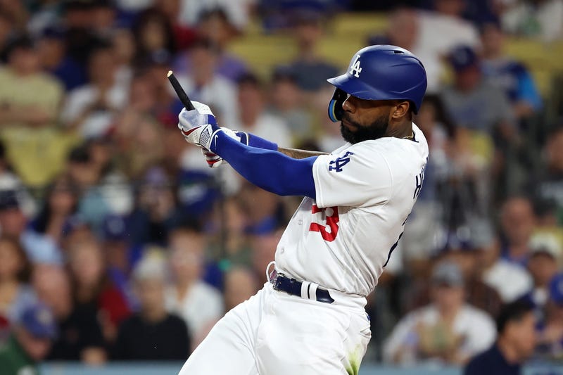 Los Angeles Dodgers right fielder Jason Heyward (23) breaks a bat on a fly ball against the Arizona Diamondbacks