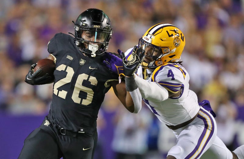 Army Black Knights running back Kanye Udoh (26) is hit by LSU Tigers linebacker Harold Perkins Jr.