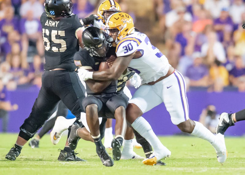 Linebacker Greg Penn III (30) makes a stop as the LSU Tigers take on the the Army Black Knights