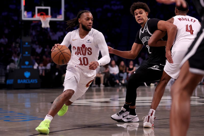 leveland Cavaliers guard Darius Garland (10) controls the ball against Brooklyn Nets forward Cameron Johnson 