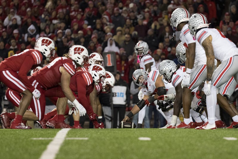 The Ohio State Buckeyes line up for a play during the fourth quarter against the Wisconsin Badgers at Camp Randall Stadium. 