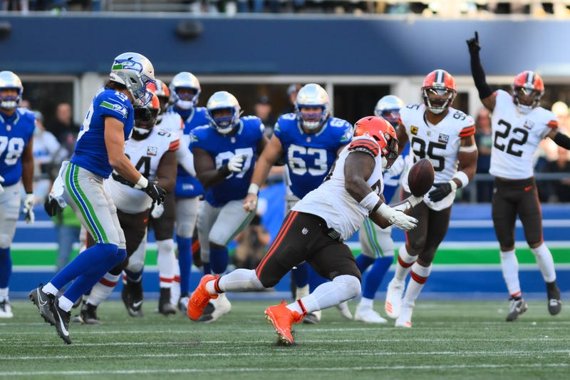 Oct 29, 2023; Seattle, Washington, USA; Cleveland Browns defensive tackle Maurice Hurst II (90) intercepts the ball against the Cleveland Browns during the second half at Lumen Field. Mandatory Credit: Steven Bisig-USA TODAY Sports