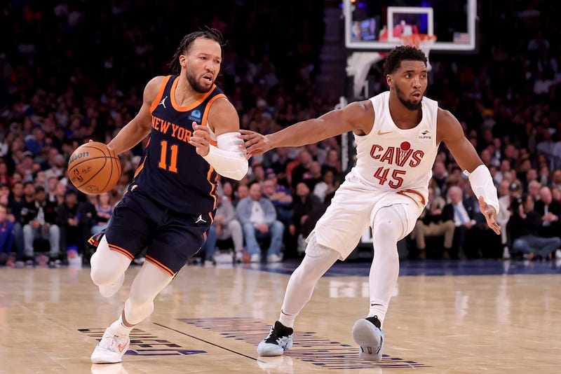 Nov 1, 2023; New York, New York, USA; New York Knicks guard Jalen Brunson (11) controls the ball against Cleveland Cavaliers guard Donovan Mitchell (45) during the fourth quarter at Madison Square Garden.