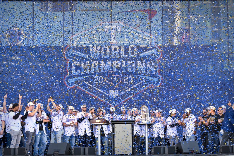 A view of the Texas Rangers team as the confetti flies during the celebration outside of the ballpark after the World Series championship parade at Globe Life Field.