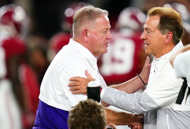 LSU coach Brian Kelly with former Alabama coach Nick Saban