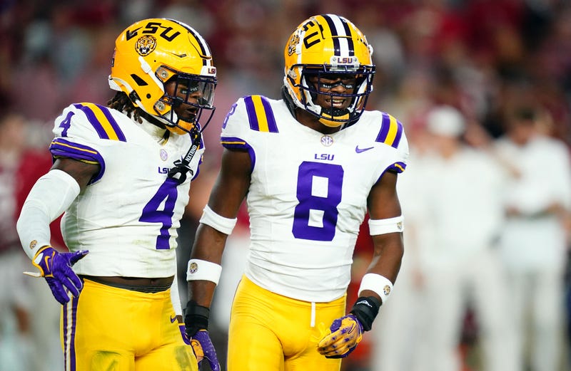 SU Tigers linebacker Harold Perkins Jr. (4) and safety Major Burns (8)
