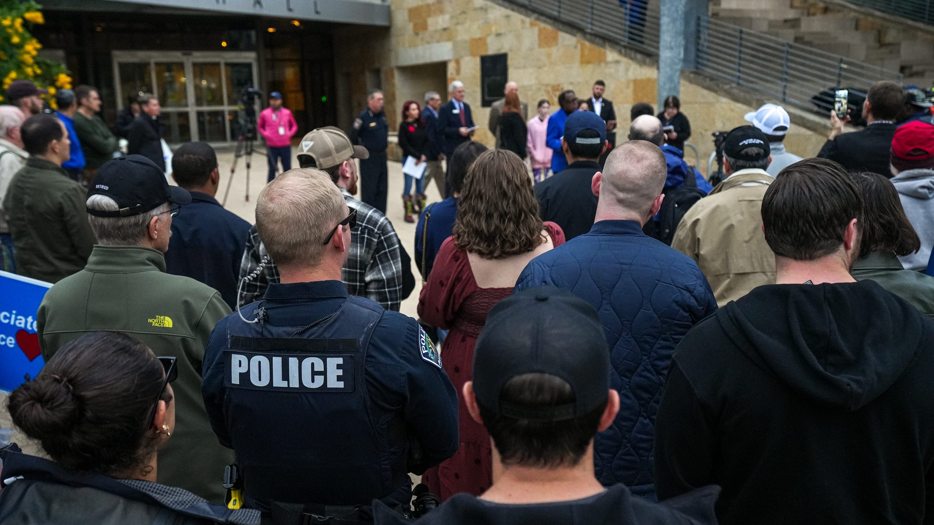 Downtown vigil Sunday evening honors fallen APD officer Jorge Pastore, another officer wounded in SWAT incident