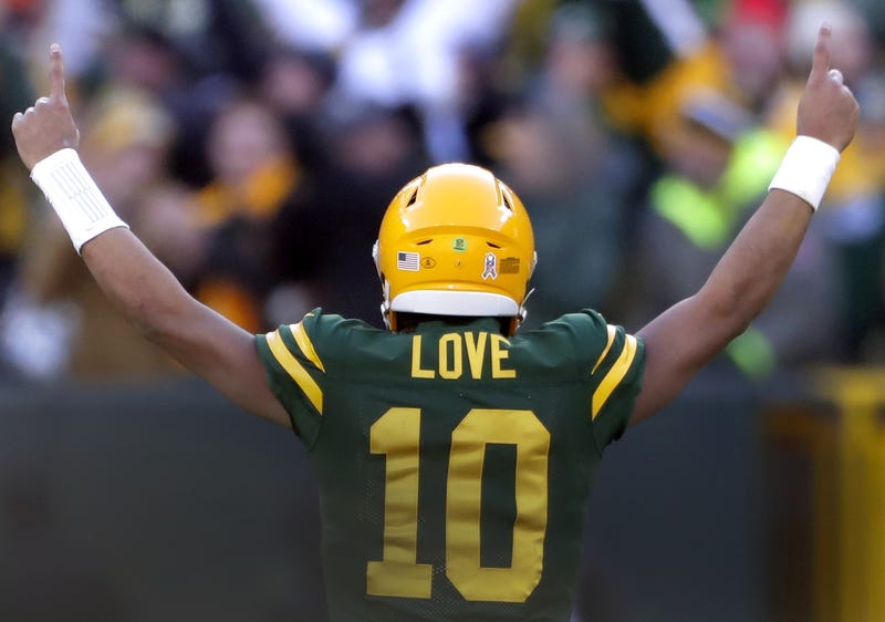 Nov 19, 2023; Green Bay, Wis, USA; Green Bay Packers quarterback Jordan Love (10) reacts following a fourth quarter touchdown against the Los Angeles Chargers at Lambeau Field.