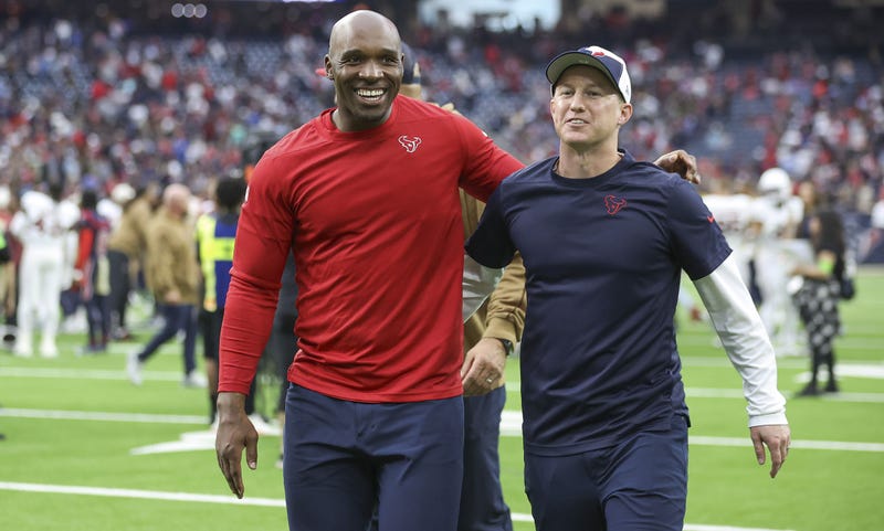 Houston Texans head coach DeMeco Ryans (left) and offensive coordinator Bobby Slowik walk off the field after a game.