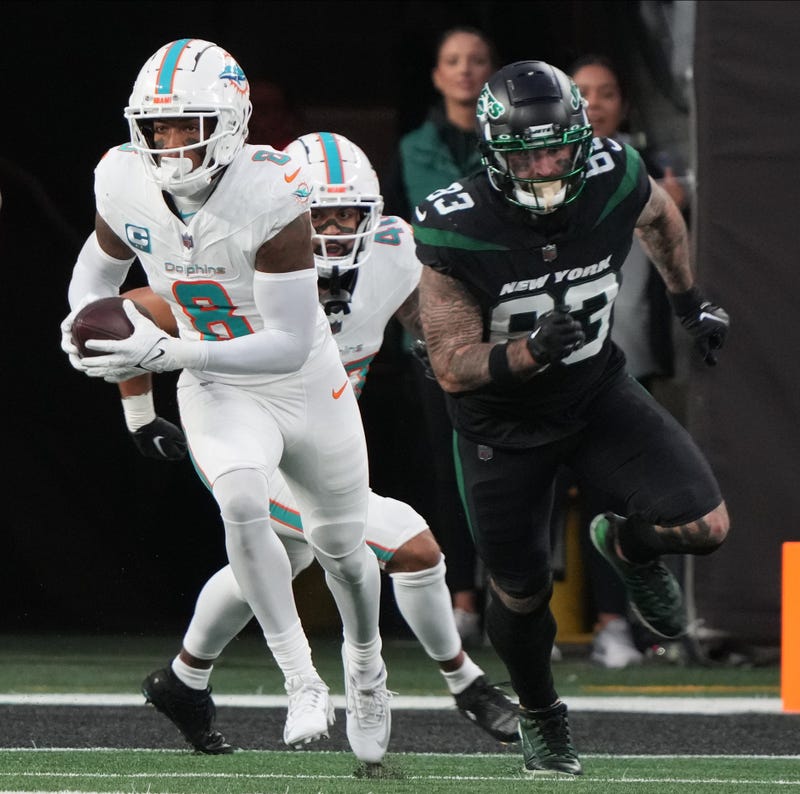 East Rutherford, NJ November 24, 2023 -- Jevon Holland of Miami returned thisinterception for a 100 yard TD in the first half as the Miami Dolphins defeated the NY Jets 34-13 at MetLife Stadium