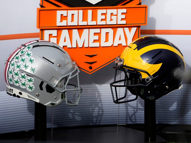Nov. 25, 2023; Ann Arbor, Mi., USA; Helmets for the Ohio State Buckeyes and the Michigan Wolverines decorate the on-field set for ESPN s College GameDay before Saturday s NCAA Division I football game at Michigan Stadium.