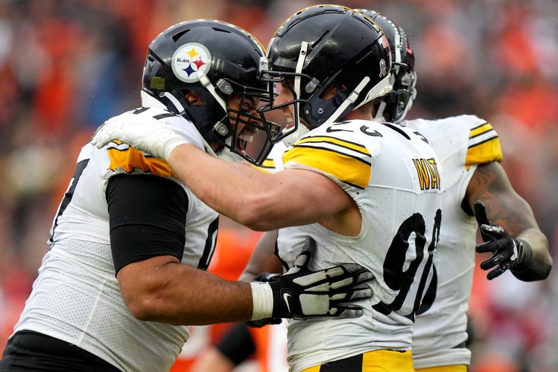 Cam Heyward and TJ Watt embracing