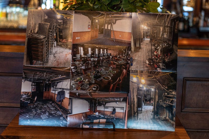 Photos of fire damage to Karl's Cabin in Salem Township sit on display on Tuesday, November 28, 2023, during a media day before the business reopens following a devastating fire earlier this year. Nine months of renovation and restoration work prepared Karl's Cabin to welcome back customers.