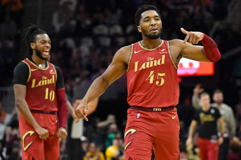 Cavaliers guard Donovan Mitchell (45) and guard Darius Garland (10) celebrate in the second quarter against the Atlanta Hawks at Rocket Mortgage FieldHouse.