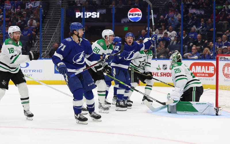 Dec 4, 2023; Tampa, Florida, USA; Tampa Bay Lightning center Anthony Cirelli (71) scores a goal against the Dallas Stars during the third period at Amalie Arena.
