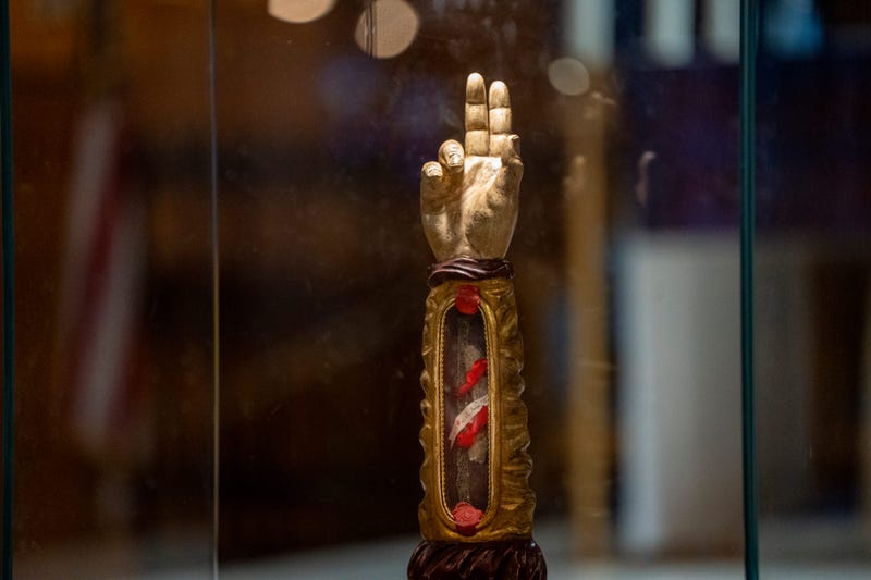 A relic of St. Jude is shown at the Church of the Assumption in Emerson on Thursday, Dec. 7, 2023. The relic allegedly consists of a bone from the arm of St. Jude, known as the patron saint of hopeless causes and the Apostle of the Impossible, and is encased in a wooden vessel shaped like an arm within a glass case.