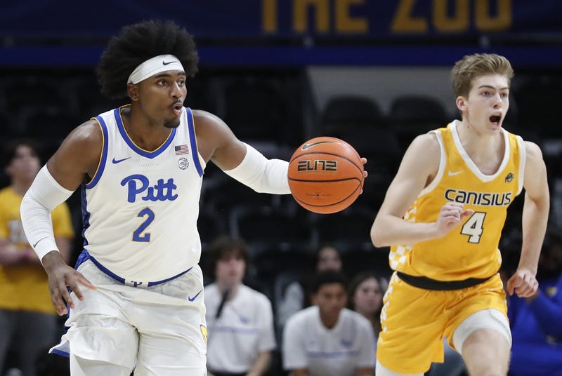 Blake Hinson dribbling on Canisius