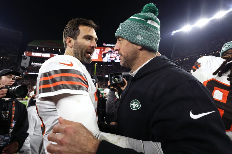 Joe Flacco and Aaron Rodgers hug after game