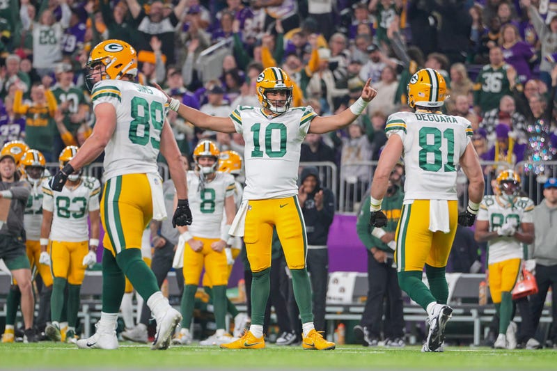 Dec 31, 2023; Minneapolis, Minnesota, USA; Green Bay Packers quarterback Jordan Love (10) celebrates his touchdown against the Minnesota Vikings in the second quarter at U.S. Bank Stadium.
