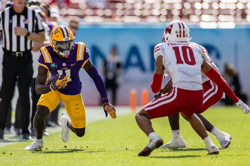 LSU Tigers wide receiver Brian Thomas Jr. (11) runs with the ball
