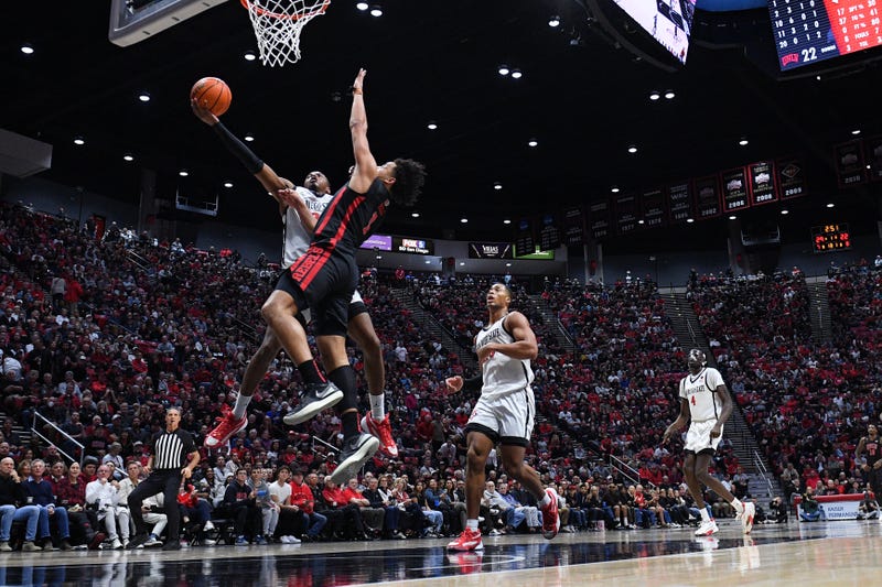 San Diego State Aztecs player Micah Parrish attempts a layup against UNLV.