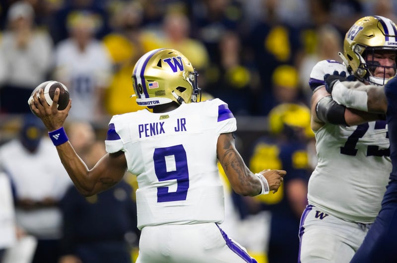 Detailed view of the jersey of Washington Huskies quarterback Michael Penix Jr. (9) against the Michigan Wolverines during the 2024 College Football Playoff national championship game at NRG Stadium.