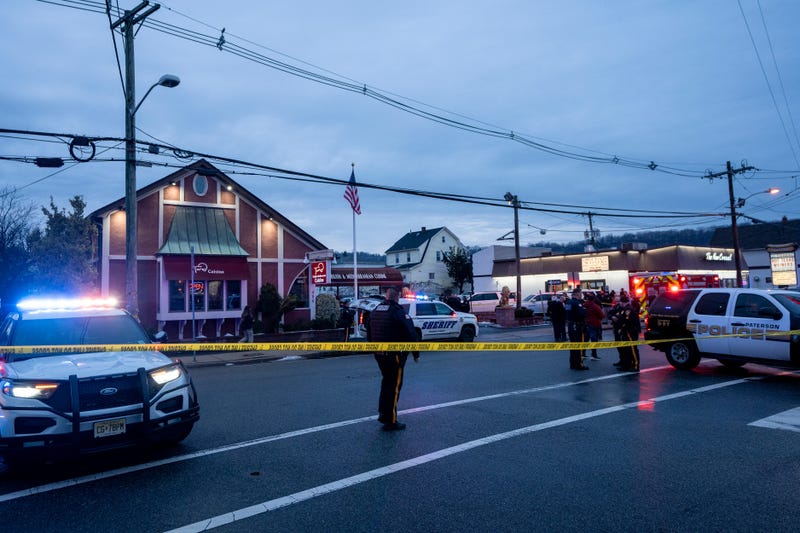 First responders are seen outside Toros restaurant on Jan. 23, 2024