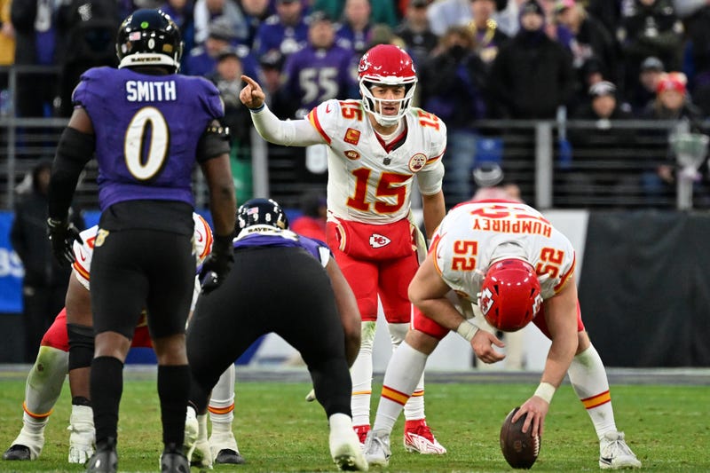 Kansas City Chiefs quarterback Patrick Mahomes (15) signals before a snap against the Baltimore Ravens during the second half in the AFC Championship football game at M&T Bank Stadium.