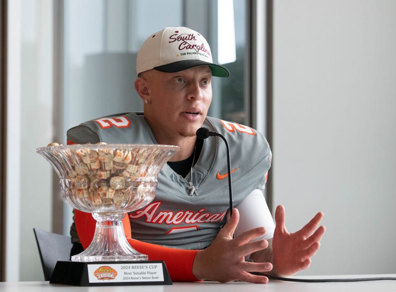 Former Oklahoma/South Carolina QB and game Most Valuable Player Spencer Rattler (2) answers questions during the Reese's Senior Bowl 
