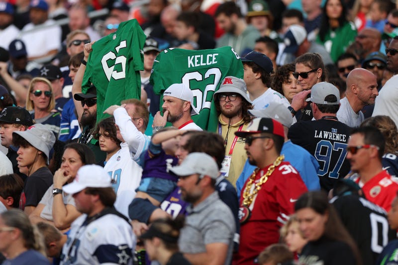 A fan holds up a Jason Kelce jersey during the 2024 Pro Bowl at Camping World Stadium on Feb 4, 2024, in Orlando, Florida.