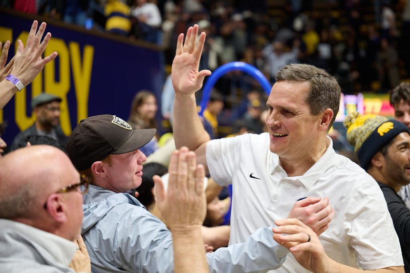 Feb 7, 2024; Berkeley, California, USA; California Golden Bears head coach Mark Madsen celebrates with fans after Cal defeated the USC Trojans 83-77 in overtime at Haas Pavilion.